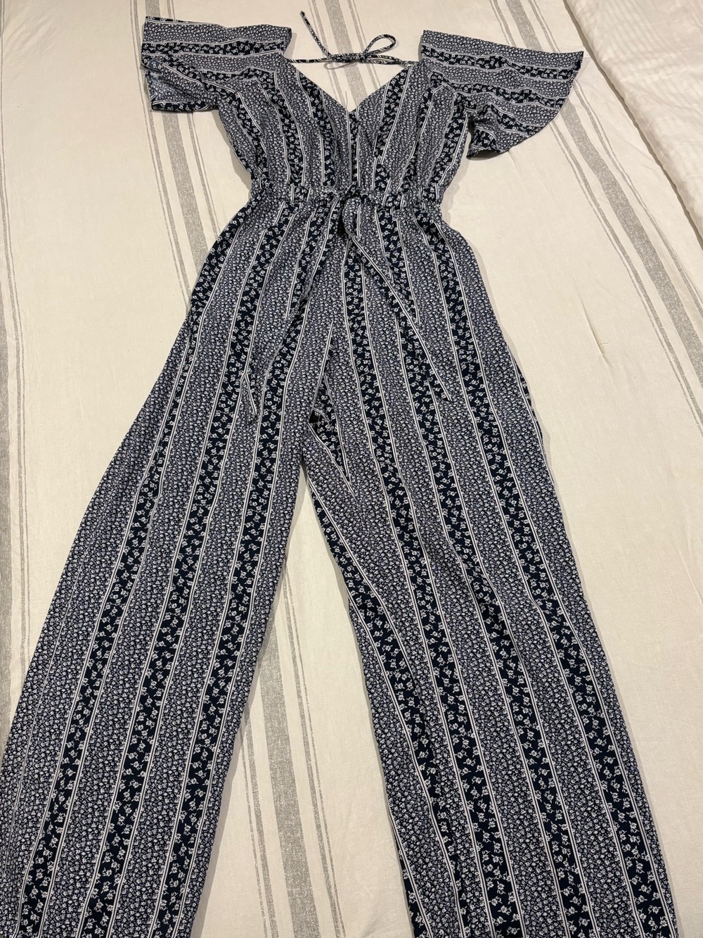 indulge Navy and Cream Striped Jumpsuit with Flutter Sleeves & Drawstring Waist